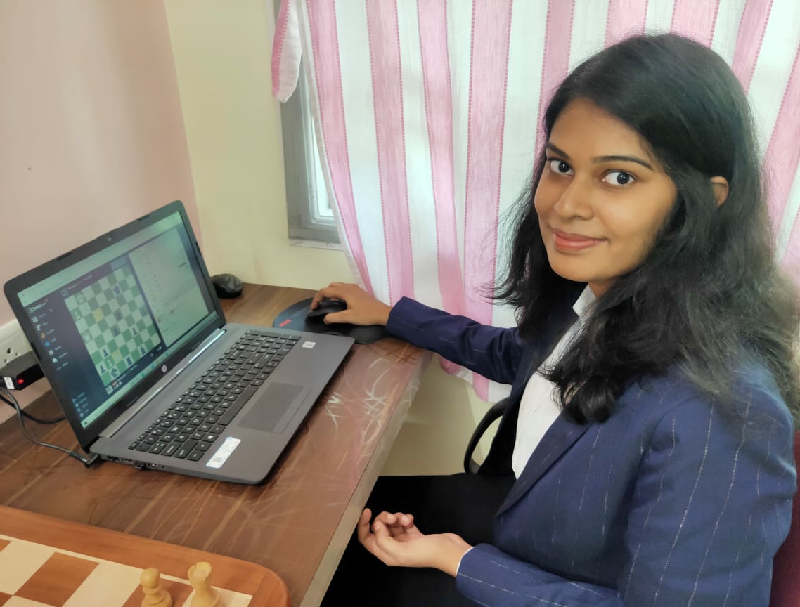 P. V. Nandhidhaa preparing chess online at her home